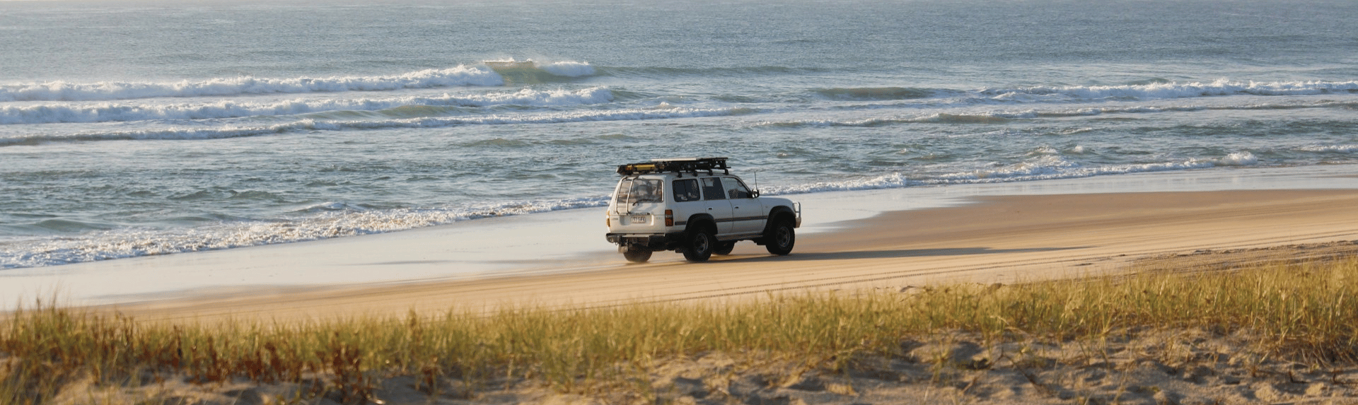 K'gari beach with a 4WD